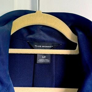 Navy zip blouse, understated and elegant.